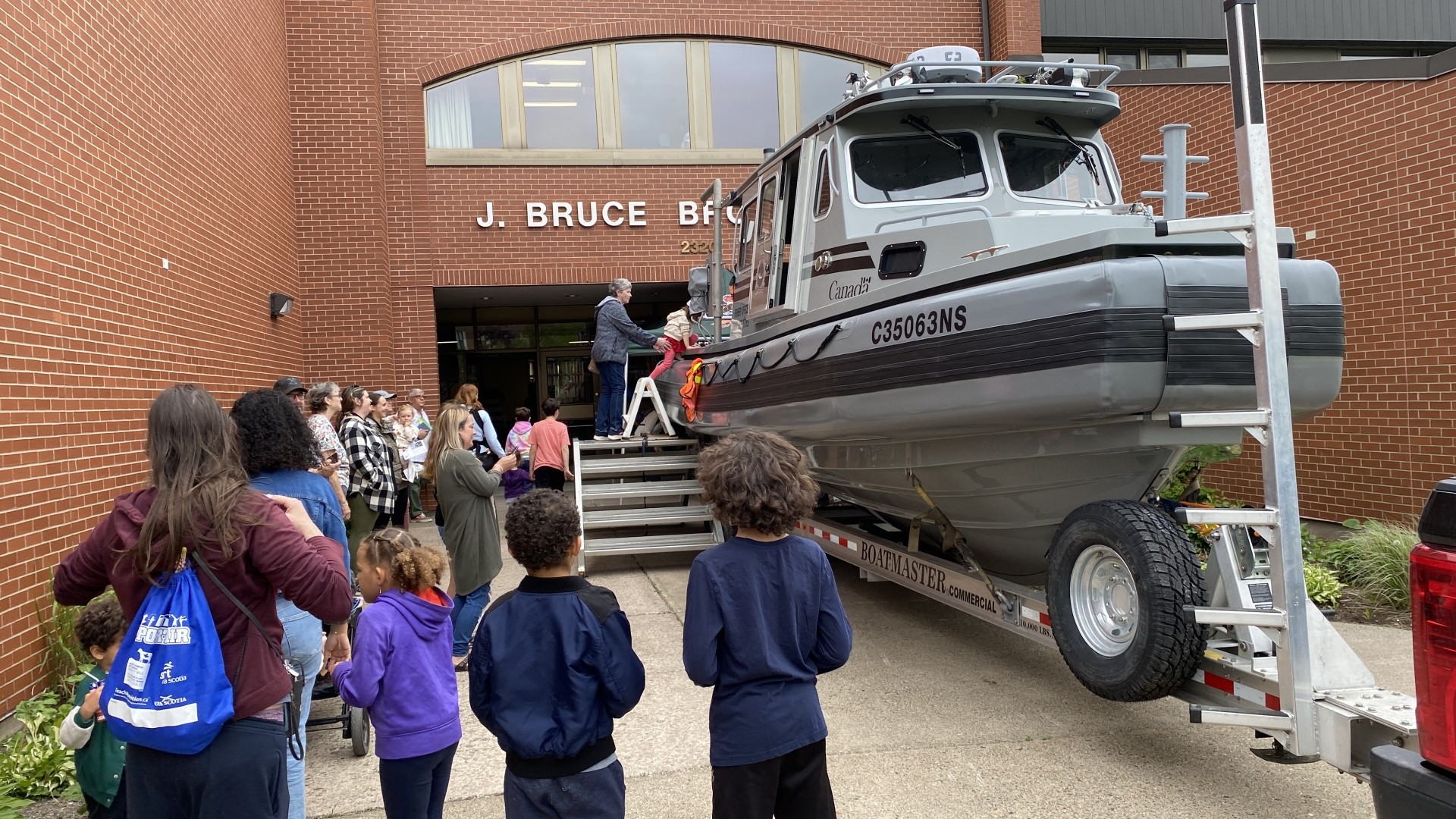 A boat parked at J. Bruce Brown Hall on World Oceans Day 2024
