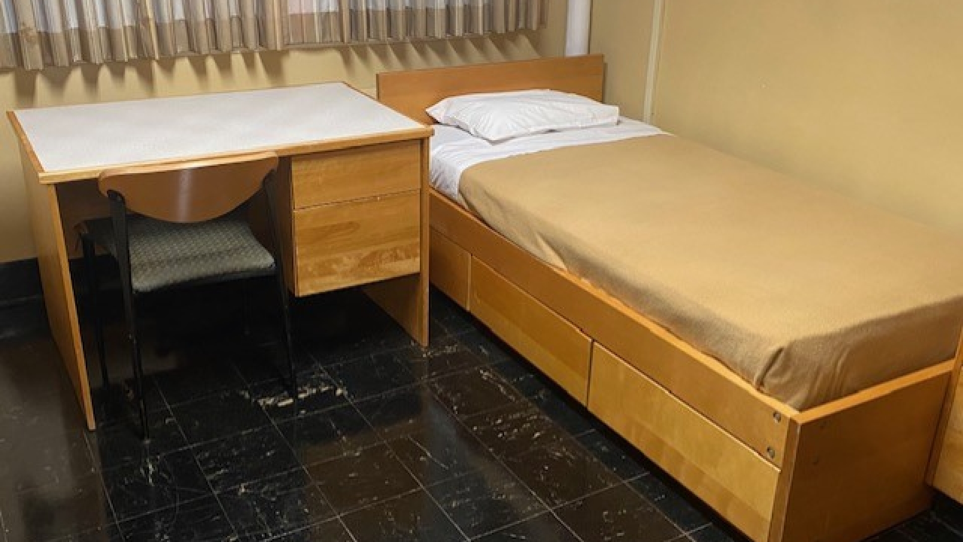 A Bed and Desk in Cameron Hall