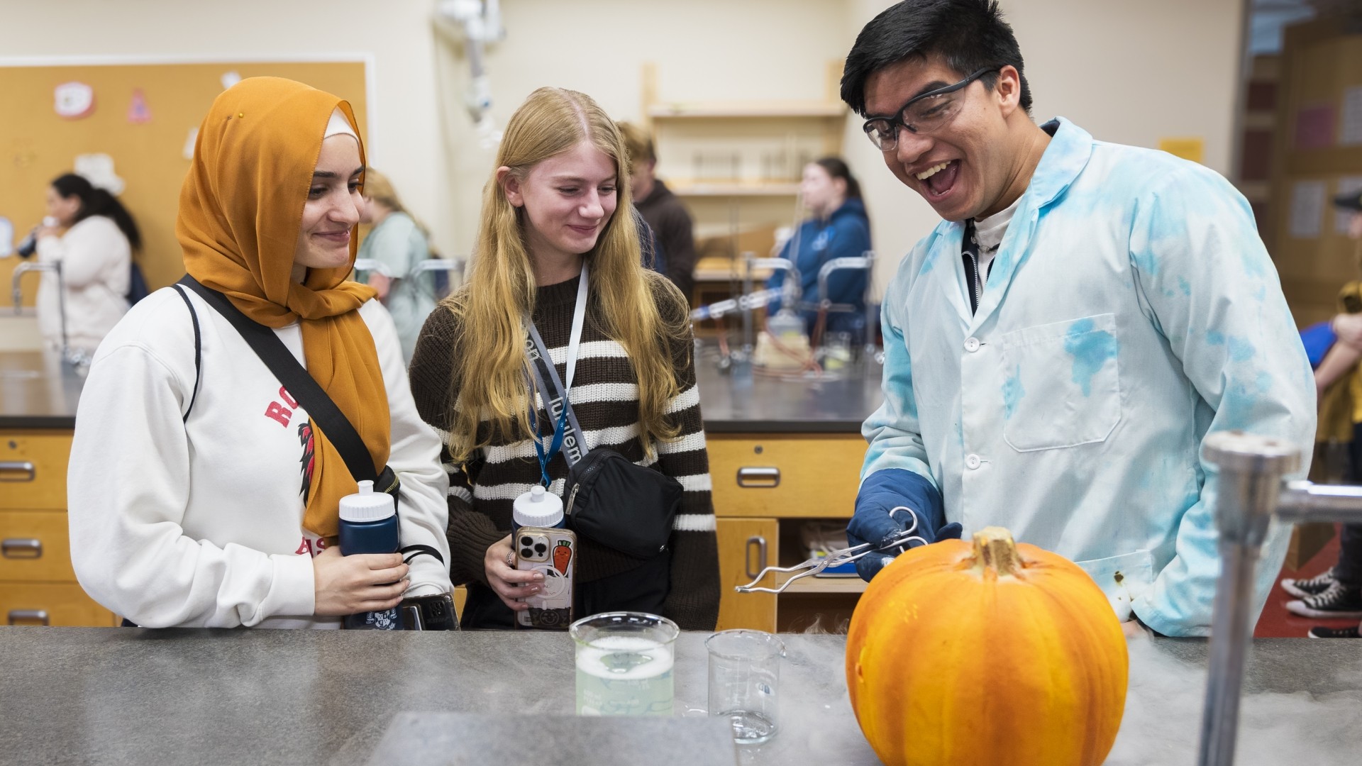 Chemistry student doing a demonstration during Open House 2024