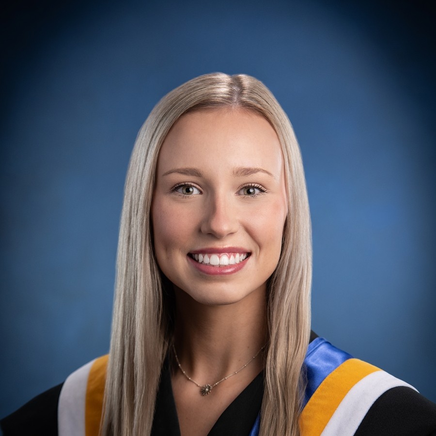 Graduation photo of blonde person