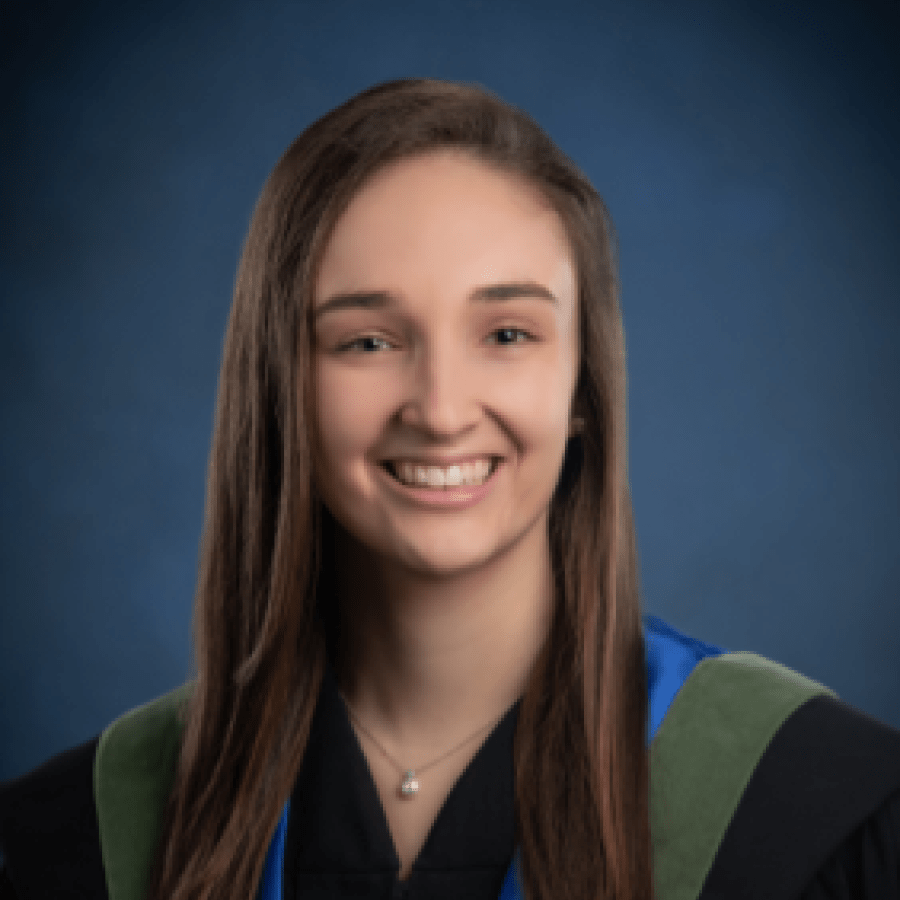 Graduation portrait of a girl with long brown hair 