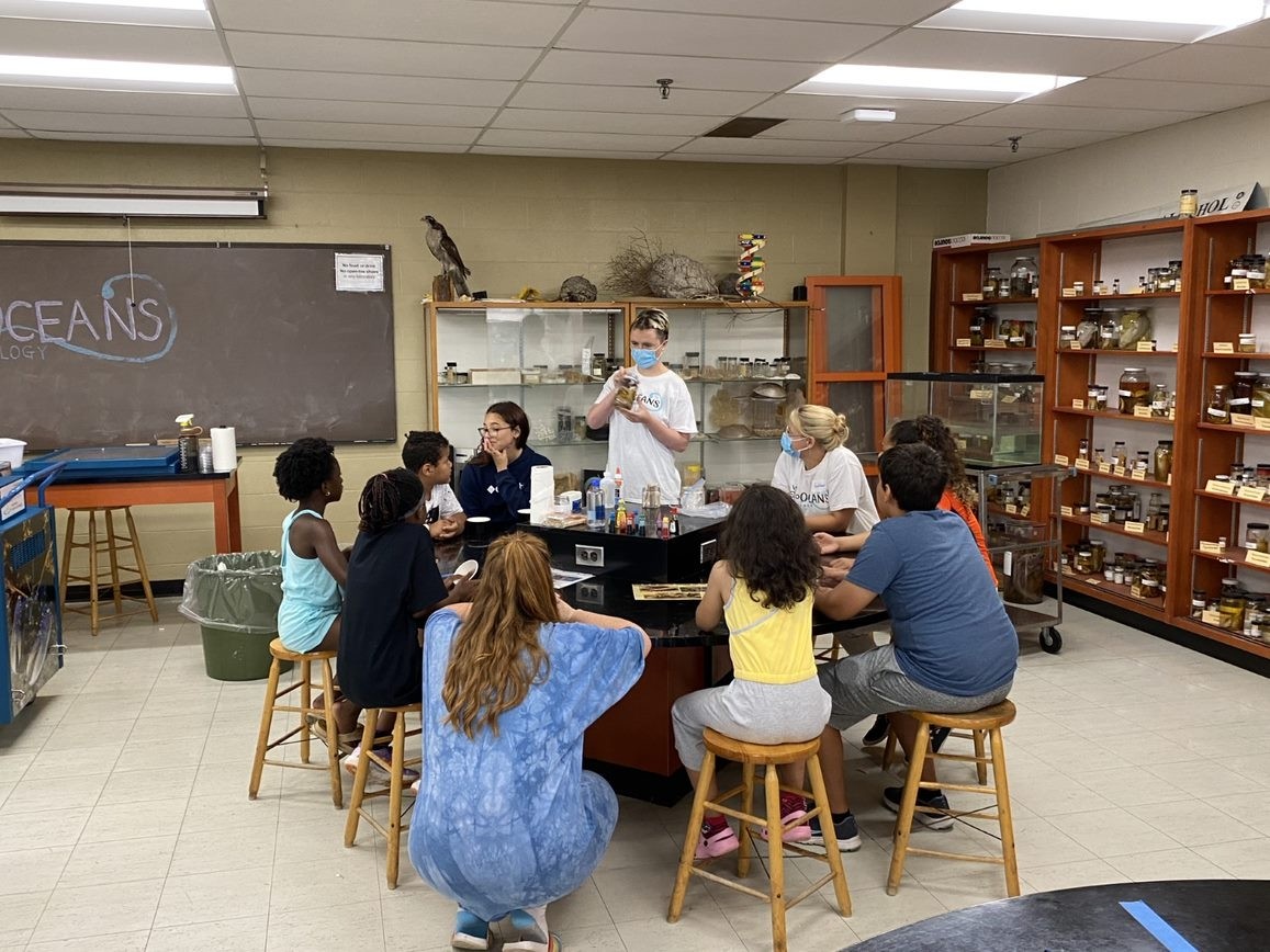 Student Leader Teaching to Students on The Lab