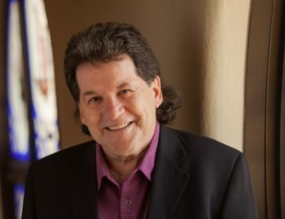 Headshot of Reg Bibby