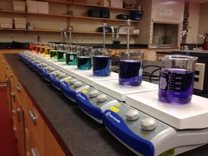 A row of laboratory equipment sitting on top of a counter