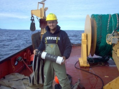 Program Graduate on a Boat