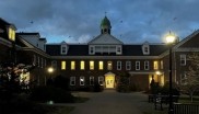 Exterior of Xavier Hall during the evening.