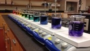 A row of laboratory equipment sitting on top of a counter